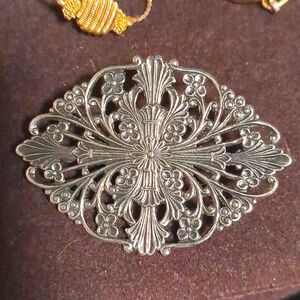 Filigree vintage brooch